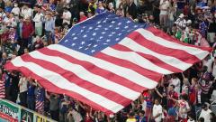 Footballs fans and USA flag
